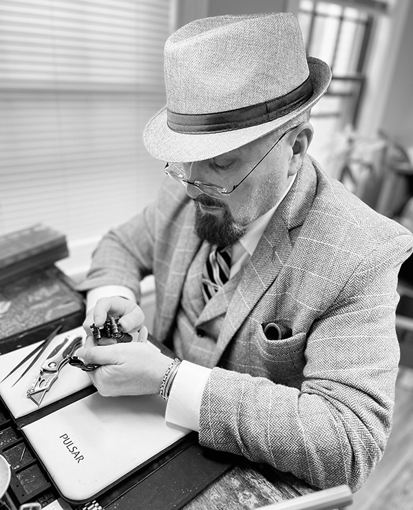 gregg working at his desk